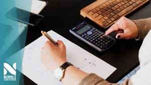 a small business owner spring cleaning their account books