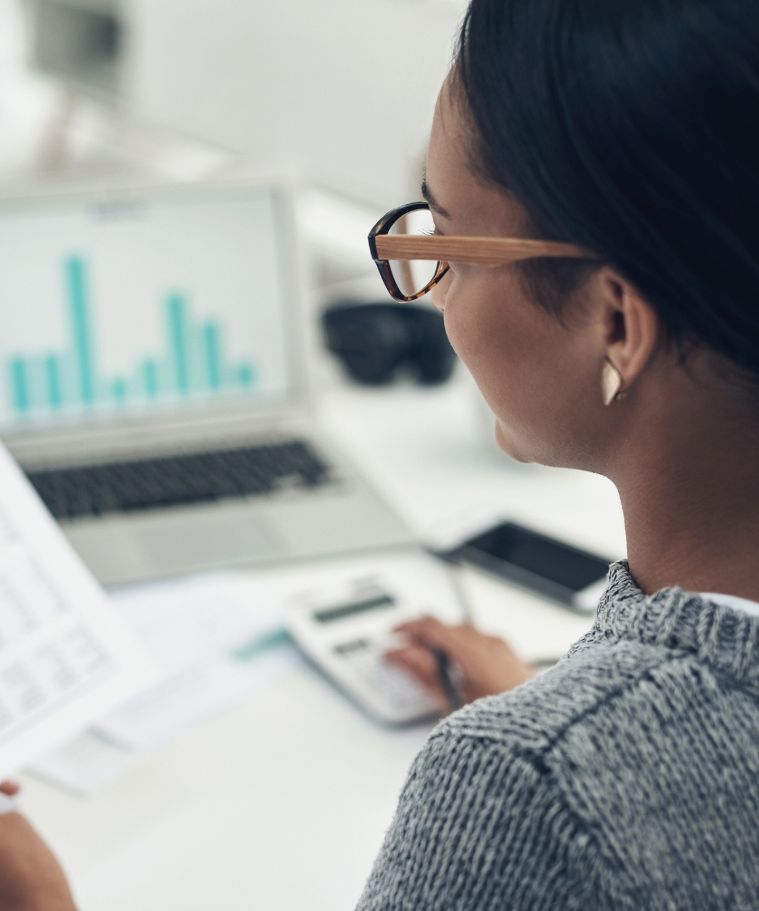 A St. Albert business owner reviewing corporate year-end with a Numble accountant