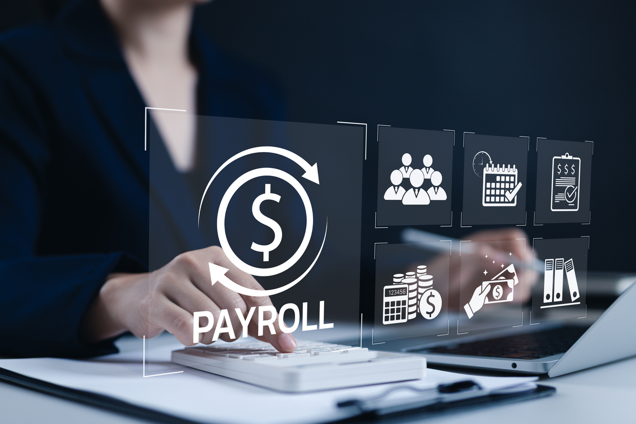 A St. Albert small-business owner and team, with payroll handled by Numble