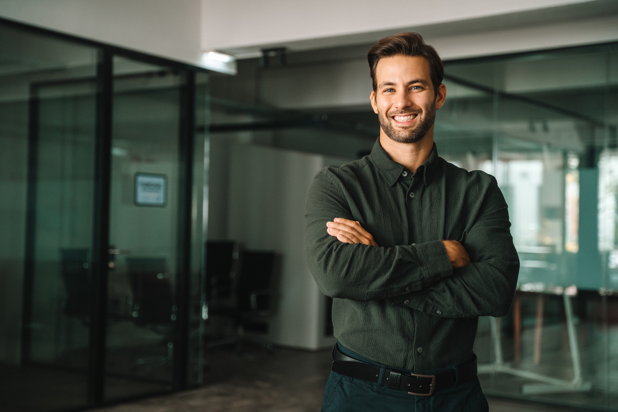 A small-business owner confidently using their new cloud accounting system